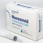 A photo of a box of Nuvaxovid and a syringe
