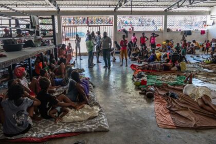 UNOCHA/Giles Clarke "Displaced people take shelter in a boxing arena in central Port-au-Prince after fleeing their homes following gang attacks".