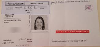 Massachusetts learner's permit with holder's photo and a red 'NOT VALID FOR IDENTIFICATION' stamp.